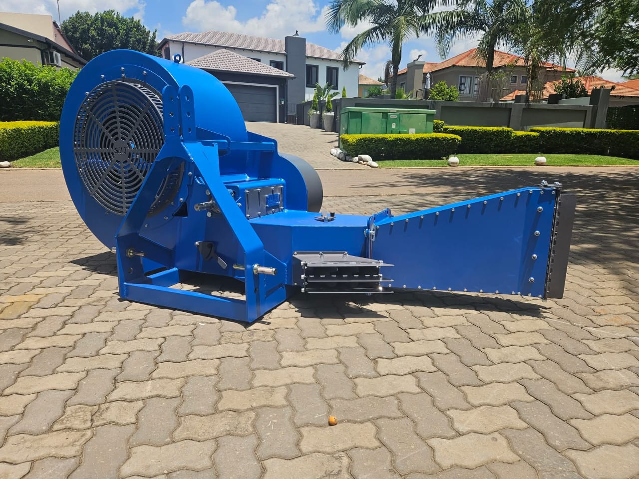 Blue SMJ Precision Orchard Blower with large fan housing and directional outlet